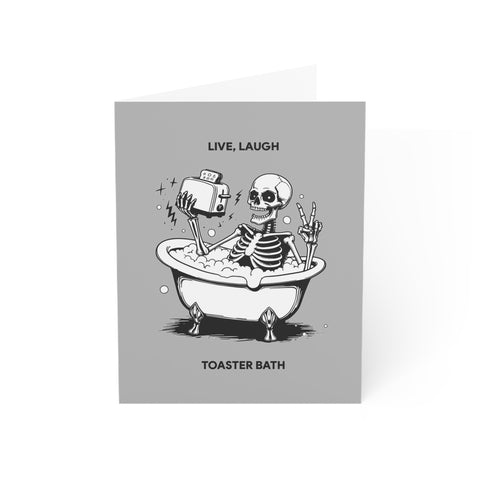 “Live, Laugh, Toaster Bath” Skeleton Bathtub Greeting Card — Humorous Greeting Card - Illustrated, Funny, Snarky, Modern